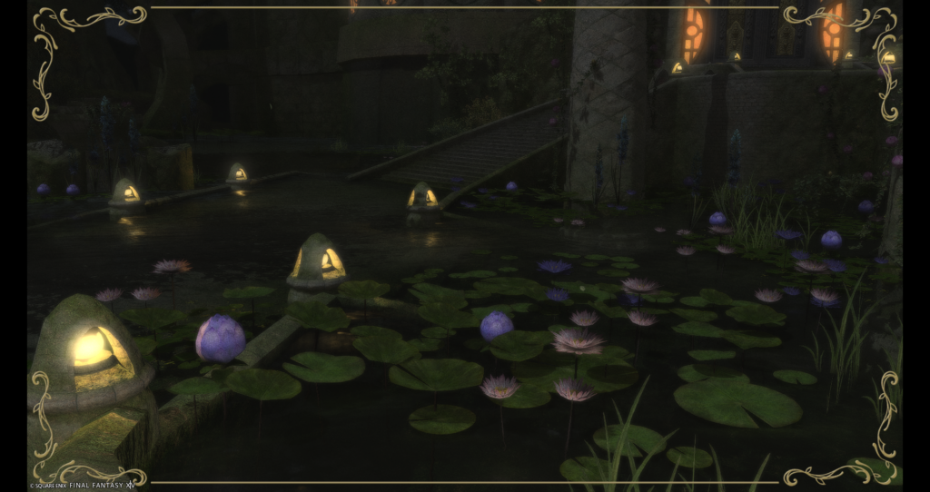 FFXIV Screenshot. A delicate night shot of a lily pond above the Sanctum of the Twelve, with lanterns forming a path in the darkness to the stairs to the building above.